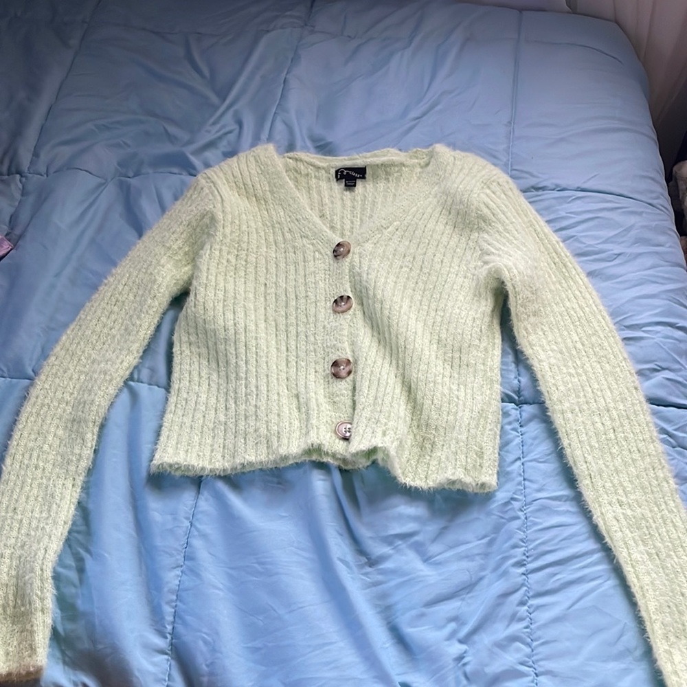 Never worn polyester green fuzzy children’s XL sweater from Target